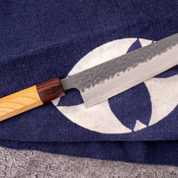 Hokiyama Bunka Aogami Super Kuro-uchi 170 mm svestrani je japanski kuhinjski nož namijenjen za pripremu mesa, ribe i povrća. Ima izrazit kiritsuke vršak ("K-vršak"), koji je dizajniran za precizan rad. Sredina ovog noža je od Hitachi Super Blue čelika (Aogami Super) koji seže u sam vrh kvalitetnijih japanskih čelika.
