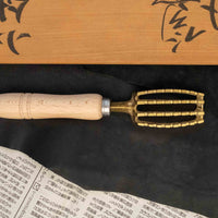 Pribor za odstranjivanje ljuski Tsunehisa