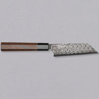 Nigara Kiritsuke Petty SG2 Damascus 120 mm je mali kuhinjski nož za upotrebu kuhinjskih poslova, kod kojih bi veći nož bio nespretan. Jezgra od praškastog čelika SG2 i hamaguri presjek profila jamstvo su dugotrajne oštrine i minimalnog održavanja. Kružni uzorak na oštrici poznat je i kao amatsubu ili uzorak kišnih kapi.