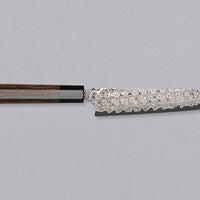 Nigara Kiritsuke Petty SG2 Damascus 150 mm je mali kuhinjski nož za upotrebu kuhinjskih poslova, kod kojih bi veći nož bio nespretan. Jezgra od praškastog čelika SG2 i hamaguri presjek profila jamstvo su dugotrajne oštrine i minimalnog održavanja. Kružni uzorak na oštrici poznat je i kao amatsubu ili uzorak kišnih kapi.