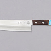 Shibamasa Santoku VG-5 170 mm je nož s iznimnim omjerom između kvalitete i cijene. Ima sve karakteristike japanskog noža: nehrđajući čelik, svestrani oblik oštrice, kasumi završetak i finu oštrinu koja će biti dorasla svakom zadatku u kuhinji. Oštrica je iznimno tanka, stoga će bez teškoća kliziti kroz namirnice.