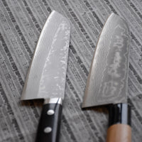 Etsu Village Santoku Damascus Black 170 mm_5  Ručno kovan Kunio Masutani damask nož. Santoku koristi se za rezanje povrća, ribe i mesa. Oblik i dužina su primjerni za manji svestrani kuhinjski nož koji će zablistati prilikom rezanja i sjeckanja na kuhinjskoj dasci. Za domaću te profesionalnu upotrebu.