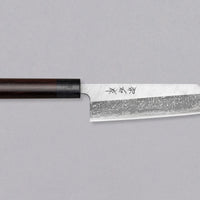 Muneishi Bunka Aogami #2 Damascus 165 mm svestrani je japanski kuhinjski nož namijenjen za pripremu mesa, ribe i povrća. Ovaj nož se drži tradicije, ali je i nadgrađuje: Oblik bunka, visokougljični čelik Aogami #2, udobna ovalna drška od palisandera. Prijelaz s migaki uzorka na magličast damast uzorak daje dašak elegancije.