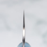 Choil. Nigara Santoku SG2 Migaki Tsuchime Turquoise 180 mm višenamjenski je japanski kuhinjski nož, pogodan za pripremu mesa, ribe i povrća. Jezgra od SG2 praškastog čelika i hamaguri presjek profila osiguravaju dugotrajnu oštrinu i minimalno održavanje. 