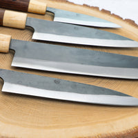 Yoshida SUJ-2 Kuro-uchi linija noževa s ručkama od ebanovine i cedrovine: ajikiri, santoku, nakiri i utility japanski nož.